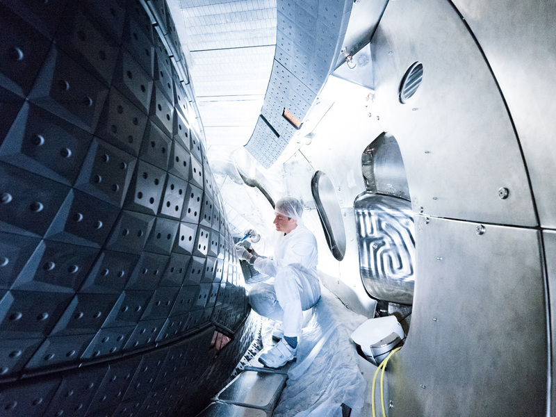 View inside the plasma vessel with graphite tile cladding.